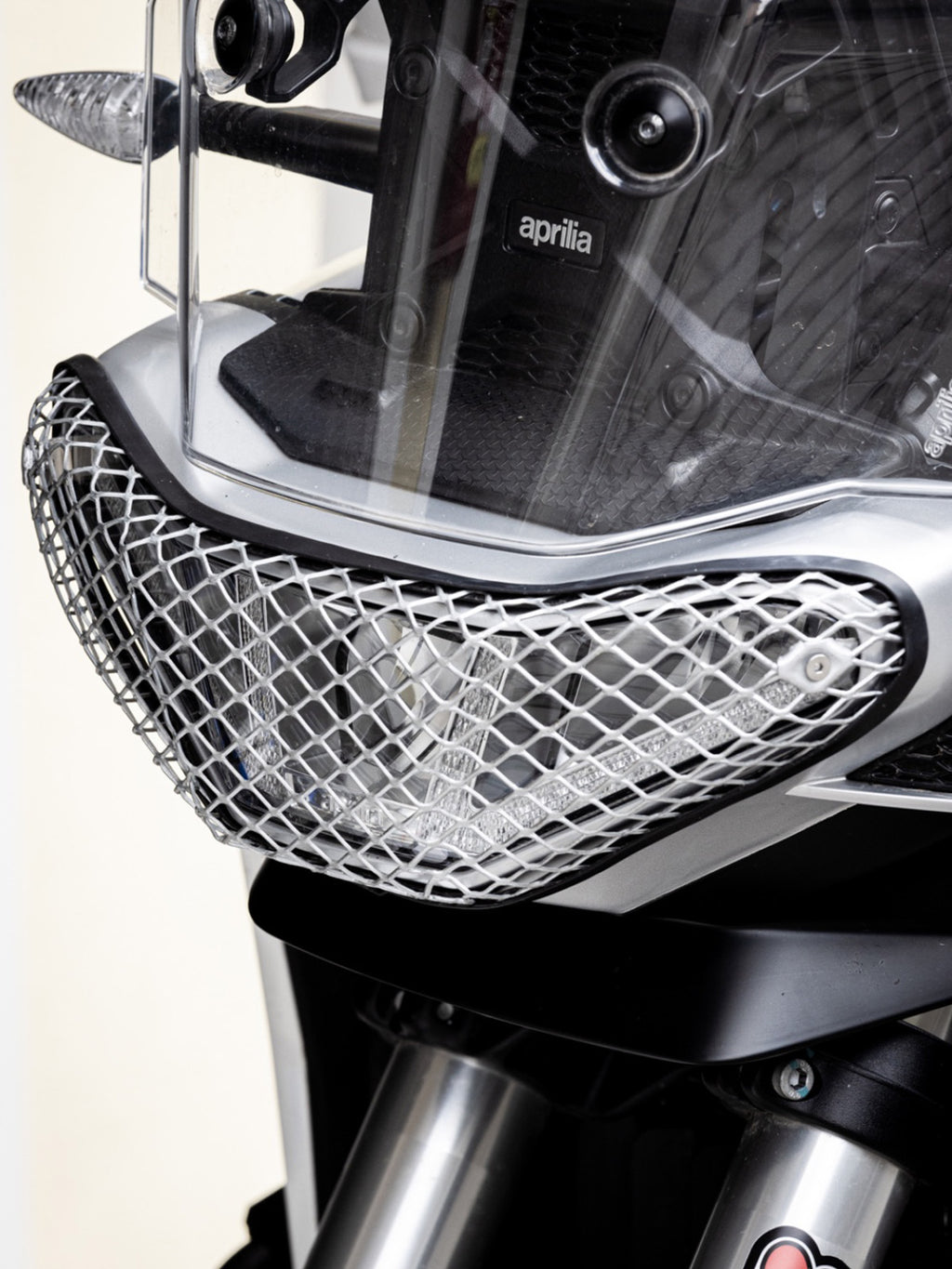 Aprilia Tuareg 660 ’21–’25 – Griglia faro protezione faro NERO