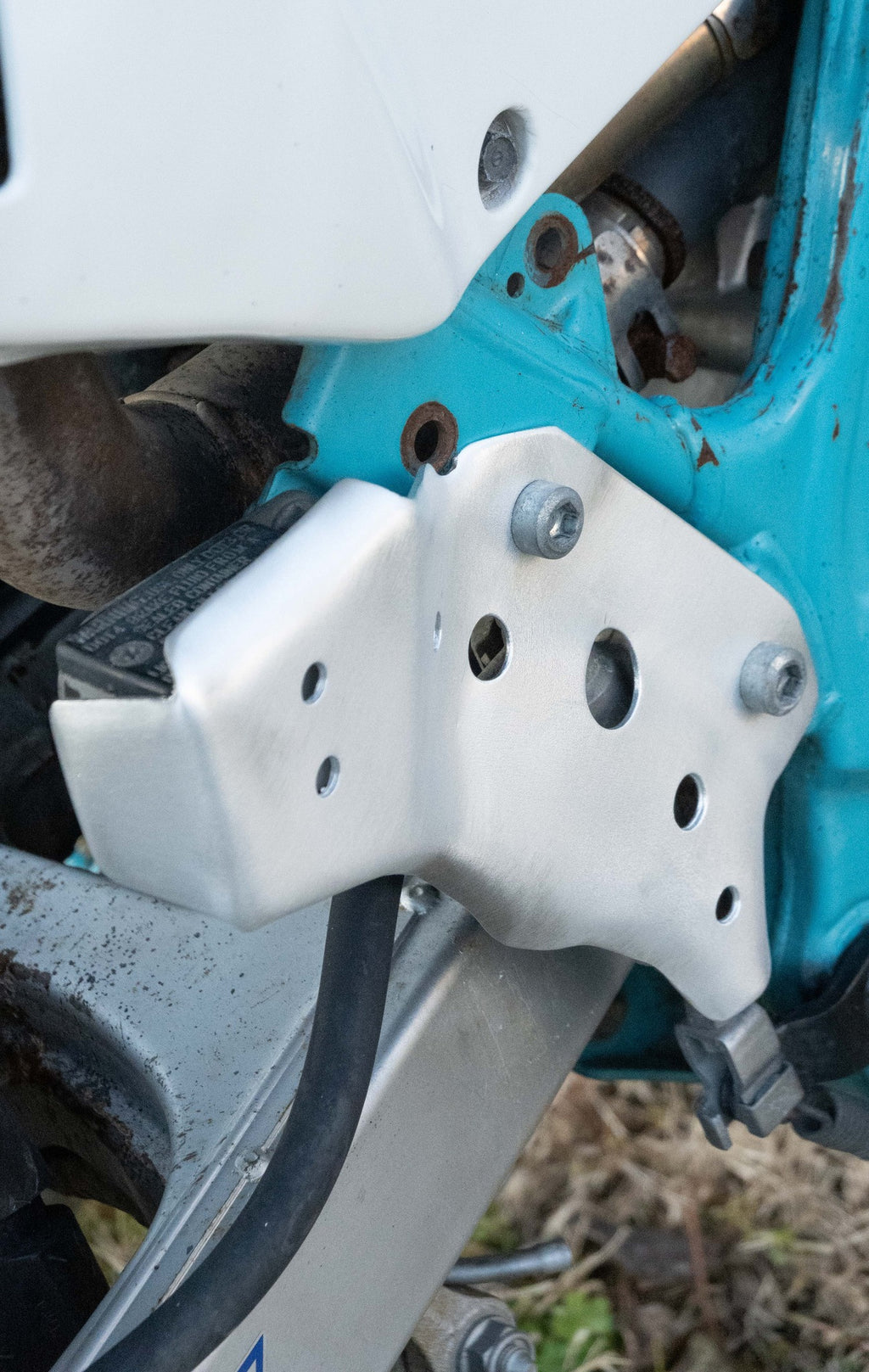 Honda Dominator NX 650 ’88–’02 – Protezione Pompa Freno Posteriore